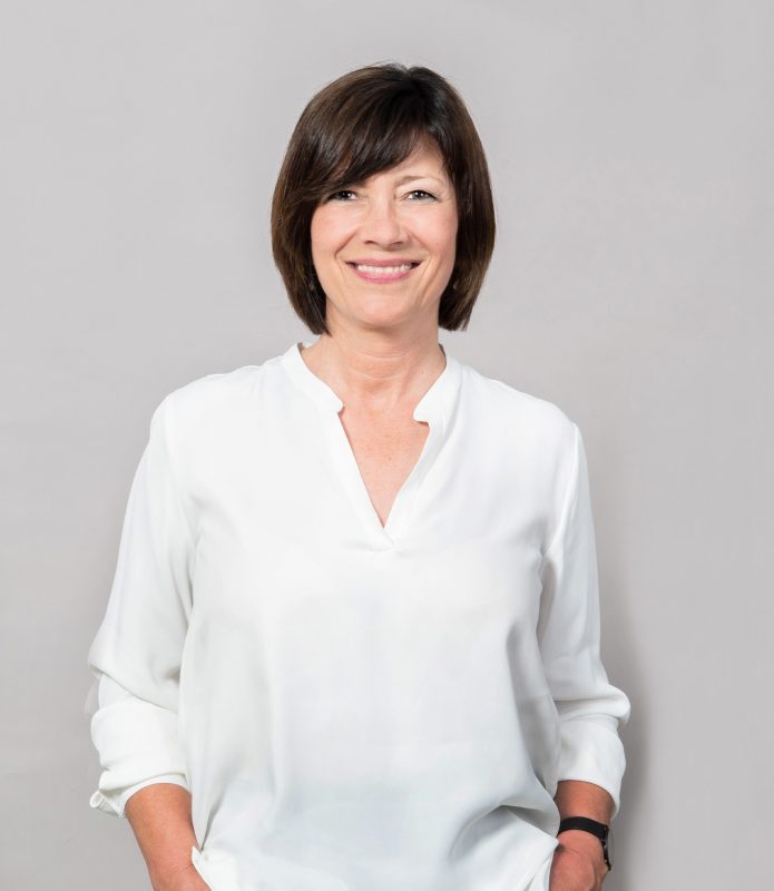 Das BIld zeigt ein freundliches Portrait unserer Kundin Judith Diedrich