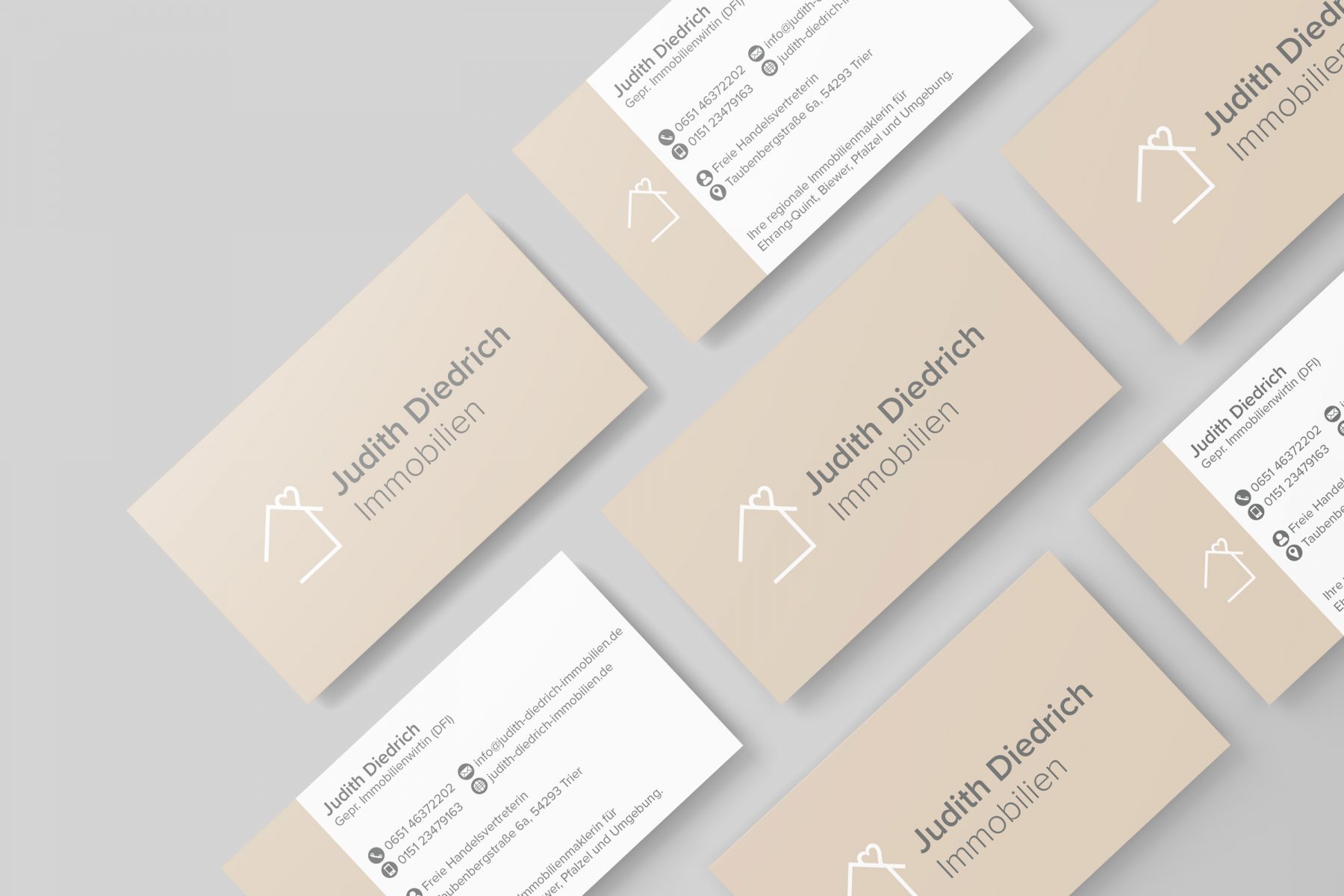 Das Bild zeigt Visitenkarten für Judith Diedrich Immobilien