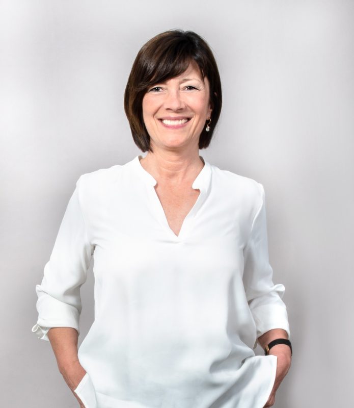 Das BIld zeigt ein freundliches Portrait unserer Kundin Judith Diedrich